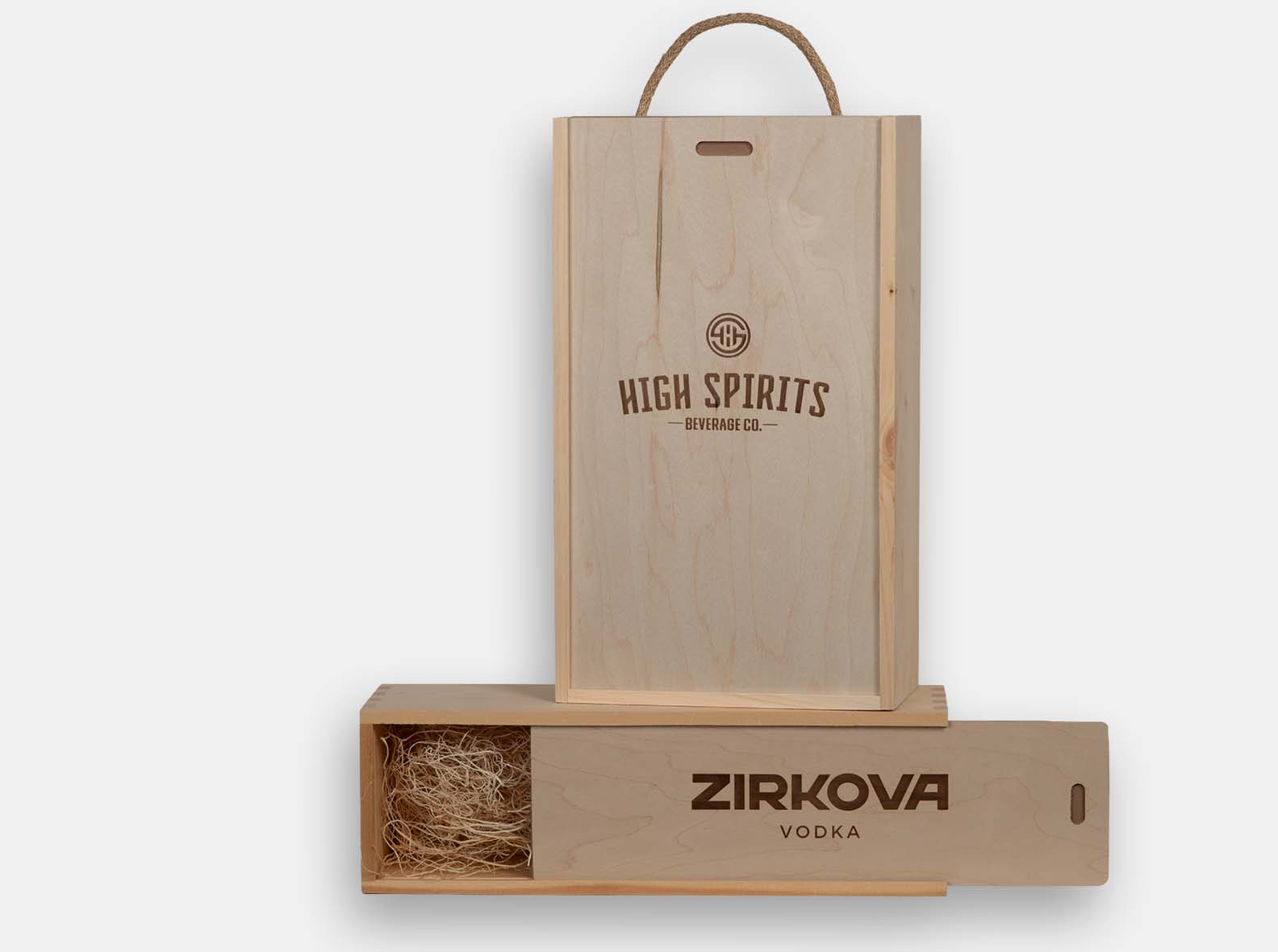 Natural pine boxes for single or double bottles. Sliding lid with box joint construction. Jute handle and wood excelsior included. Wood imprint branding.